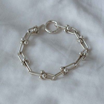 Pulsera eslabón articulado con bolitas