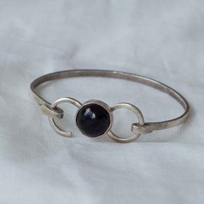 Pulsera cabujón de AZABACHE montada en infinito