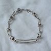 pulsera de eslabones en U y bolitas